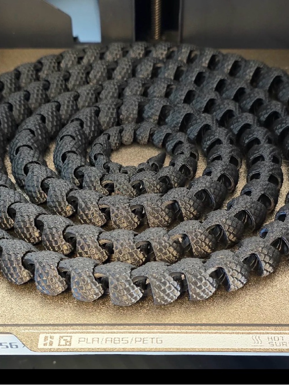 3d printed articulated snake around 70 inches long this is not AI